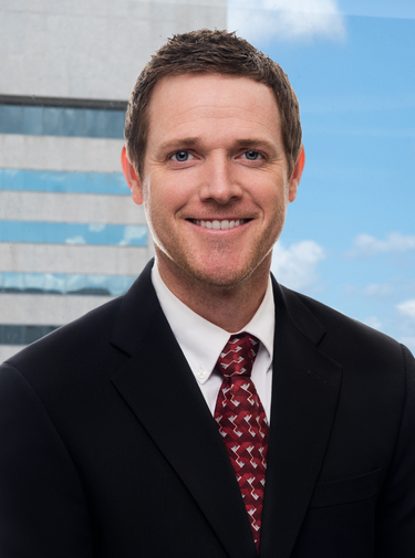 Immigration Attorney John Milburn of McCandlish Holton in Richmond, Virginia